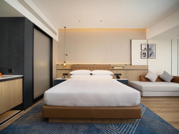 Four Points by Sheraton Chengdu, High-Tech Zone Exhibition Center : photo 1 de la chambre chambre lit king-size premium