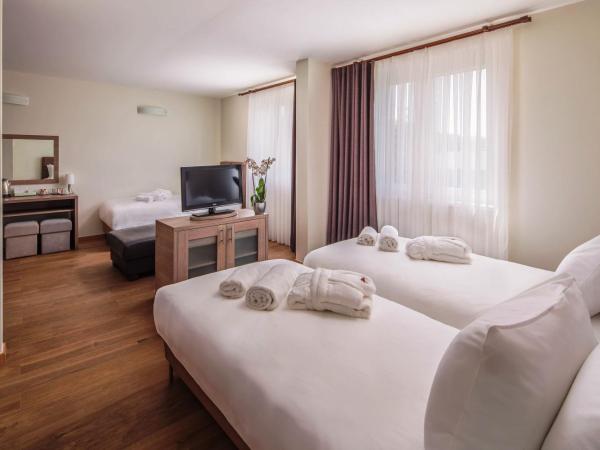 Vitta Hotel Superior : photo 7 de la chambre chambre triple