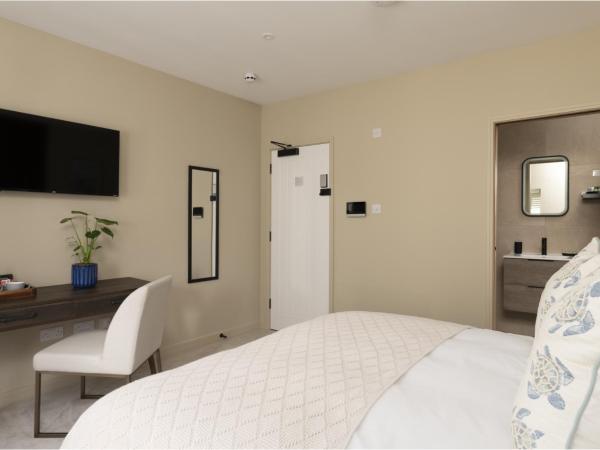 Kings Road Suites : photo 2 de la chambre chambre lit king-size supérieure