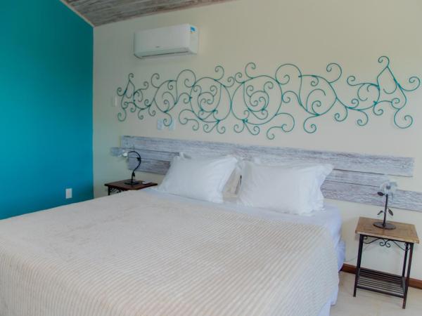 Pousada Peninsula de Buzios : photo 9 de la chambre chambre lit king-size - vue sur mer