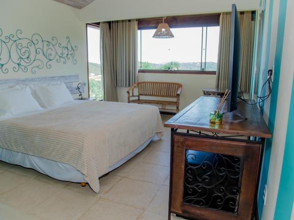 Pousada Peninsula de Buzios : photo 10 de la chambre chambre lit king-size - vue sur mer