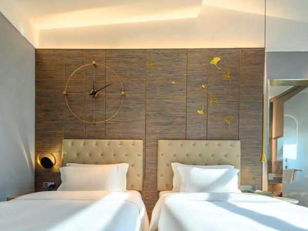 Lux Cabins Hotel Shenzhen : photo 1 de la chambre chambre lits jumeaux avec terrasse