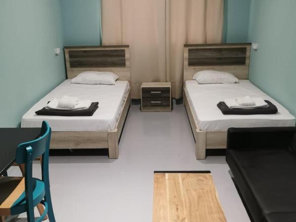 26 Amalias : photo 1 de la chambre chambre lits jumeaux