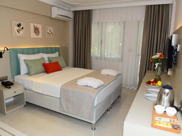 ROSE GARDEN PREMIUM : photo 1 de la chambre chambre double ou lits jumeaux standard avec balcon