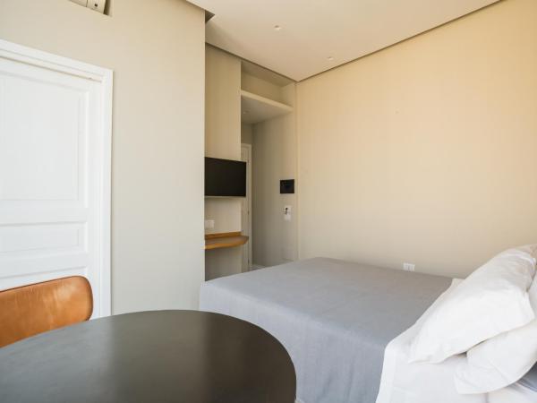 Weaver Suites By Dimorra : photo 2 de la chambre chambre lit king-size