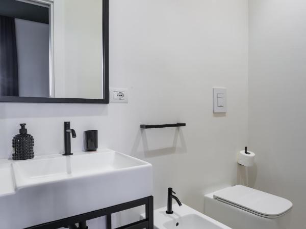 Weaver Suites By Dimorra : photo 2 de la chambre chambre double ou lits jumeaux avec salle de bains privative