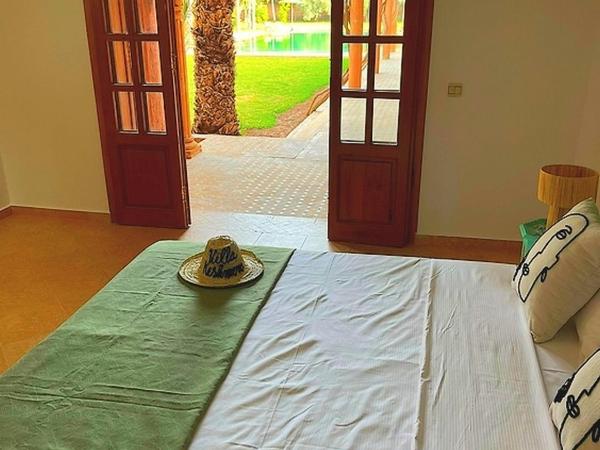 Villa Keshmere : photo 6 de la chambre chambre lit queen-size - vue sur piscine