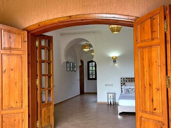 Villa Keshmere : photo 6 de la chambre suite lit queen-size - vue sur piscine