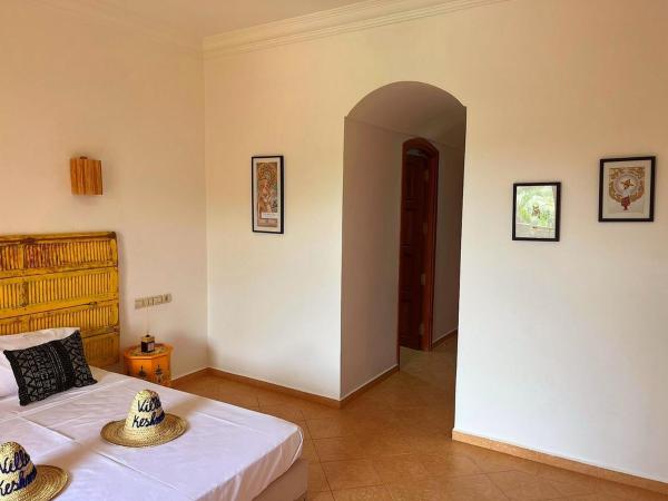 Villa Keshmere : photo 6 de la chambre chambre lit queen-size avec balcon