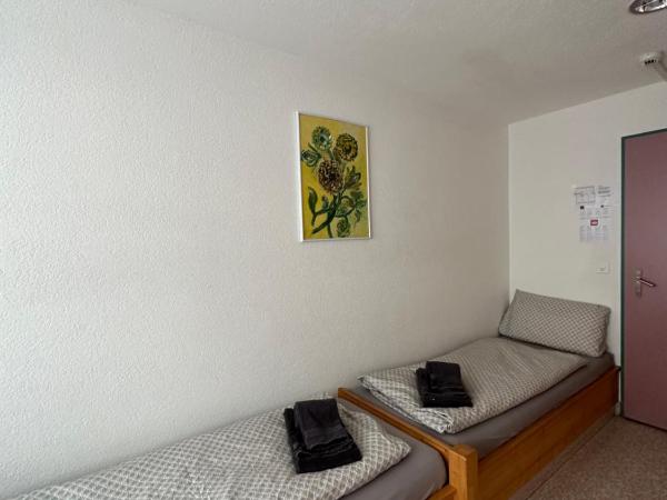 Touristenheim Bergfreude : photo 1 de la chambre chambre lits jumeaux standard avec salle de bains commune