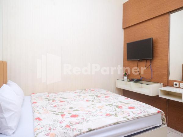 Tatti Inn Syariah Seturan RedPartner : photo 9 de la chambre chambre double standard
