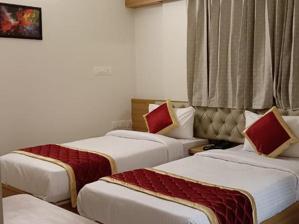 Krishna Inn : photo 1 de la chambre chambre lits jumeaux