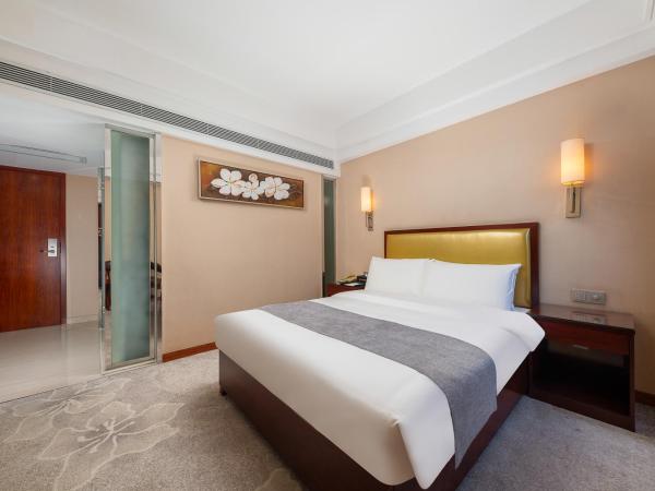 Zhongyi Hotel - Guangzhou Feixiang Park Metro Station Wanda Plaza : photo 2 de la chambre chambre supérieure lit queen-size
