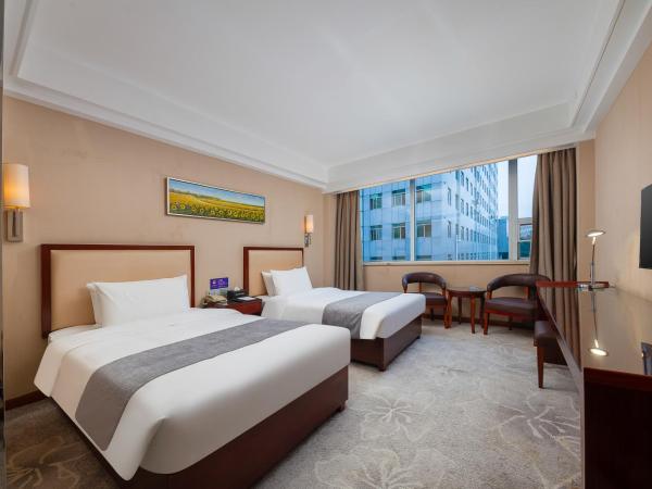 Zhongyi Hotel - Guangzhou Feixiang Park Metro Station Wanda Plaza : photo 4 de la chambre chambre lits jumeaux deluxe