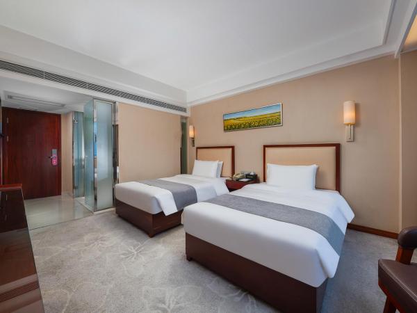 Zhongyi Hotel - Guangzhou Feixiang Park Metro Station Wanda Plaza : photo 1 de la chambre chambre lits jumeaux deluxe