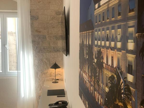 Priuli Luxury Rooms : photo 5 de la chambre chambre lit king-size deluxe - vue sur ville