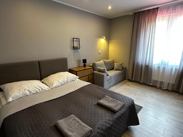 REZYDENCJA KARNAT III : photo 1 de la chambre chambre triple standard