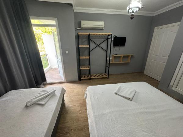 GÜLER BUTİK HOTEL : photo 4 de la chambre chambre triple Économique