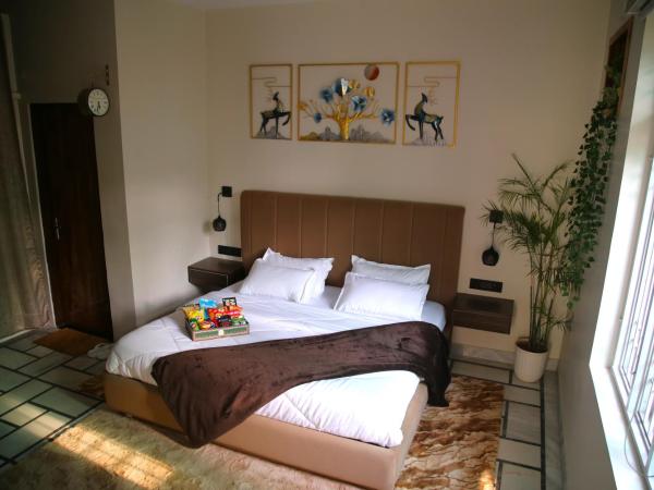 House No 87A : photo 2 de la chambre chambre lit king-size supérieure