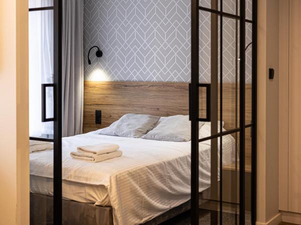 2HomeRent Apartamenty Garbary 12 : photo 1 de la chambre appartement 1 chambre