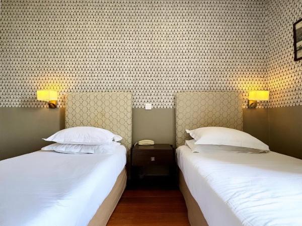 Hotel Restaurant Christophe Colomb : photo 1 de la chambre chambre lits jumeaux - vue sur mer