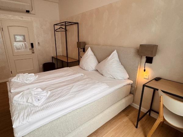 dingdong bonn - city apartments : photo 4 de la chambre chambre double ou lits jumeaux