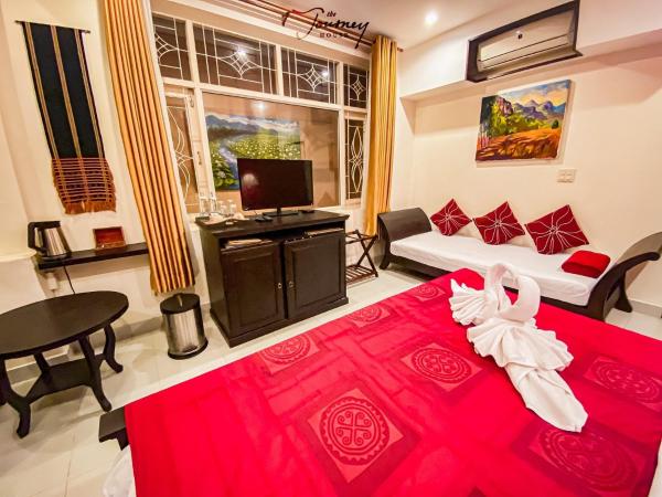 The Journey House Lifestyle Boutique Hotel : photo 1 de la chambre chambre triple avec baignoire