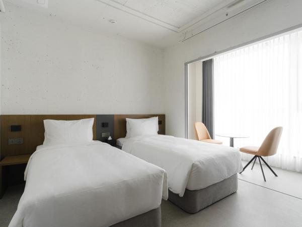 Homes Stay G-Valley Gasan : photo 3 de la chambre chambre lits jumeaux standard
