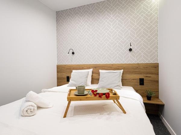 2HomeRent Apartamenty Garbary 12 : photo 9 de la chambre appartement 2 chambres