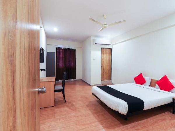 Capital O 71317 White Ridge : photo 4 de la chambre chambre triple deluxe