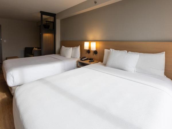 Hyatt Place Charlotte Arrowood : photo 3 de la chambre chambre avec 2 lits doubles et canapé-lit