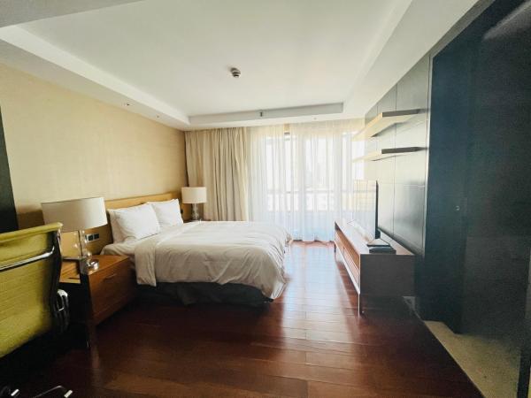 The Sandalwood Beijing Marriott Executive Apartments : photo 8 de la chambre three-bedroom apartment + 233㎡ + private bedroom + private living room + open-plan kitchen + laundry room + complimentary high-speed internet
