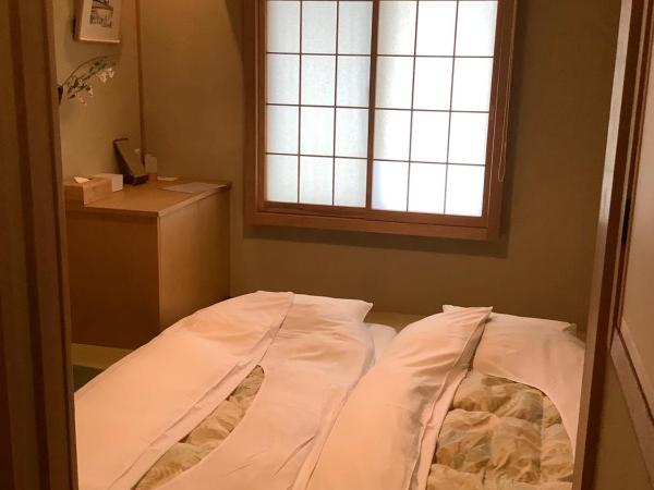 Luck You Kyoto : photo 8 de la chambre chambre lits jumeaux Économique de style japonais