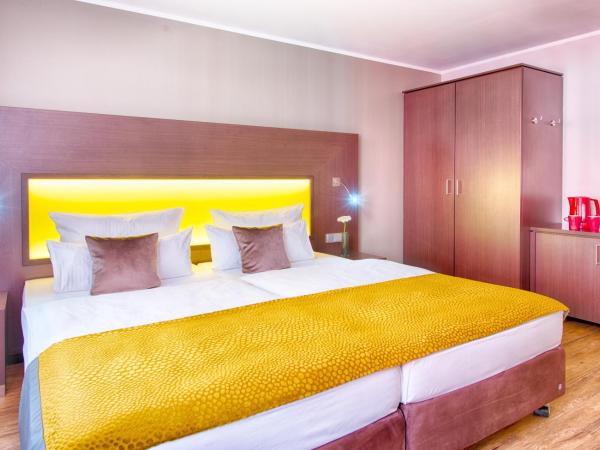 Leonardo Hotel München City Center : photo 7 de la chambre chambre deluxe double ou lits jumeaux