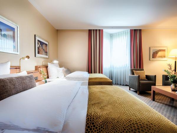 Leonardo Hotel Mannheim City Center : photo 2 de la chambre chambre quadruple exécutive