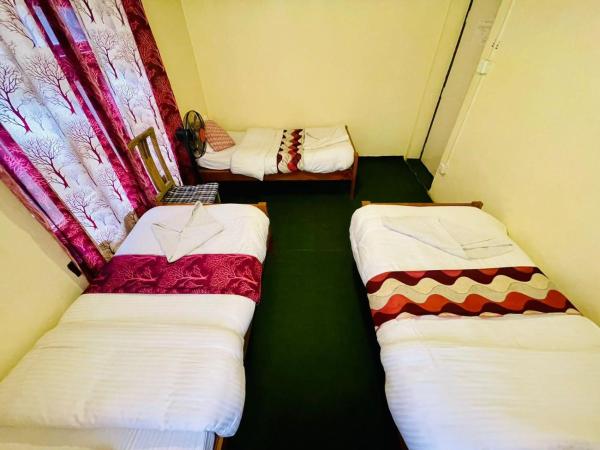 Best Hostel : photo 1 de la chambre chambre triple basique avec salle de bains commune