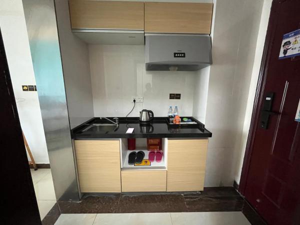 广州朴宿漫享公寓(琶洲国际会展中心店) : photo 8 de la chambre chambre lit queen-size