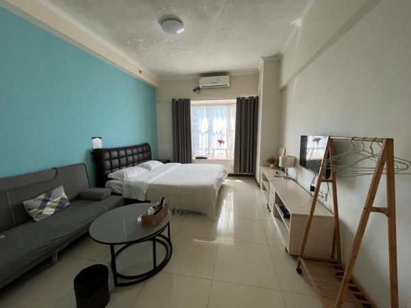 广州朴宿漫享公寓(琶洲国际会展中心店) : photo 6 de la chambre chambre lit queen-size