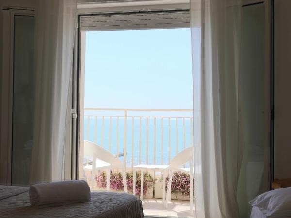 Hotel Concordia : photo 3 de la chambre chambre quadruple - vue sur mer