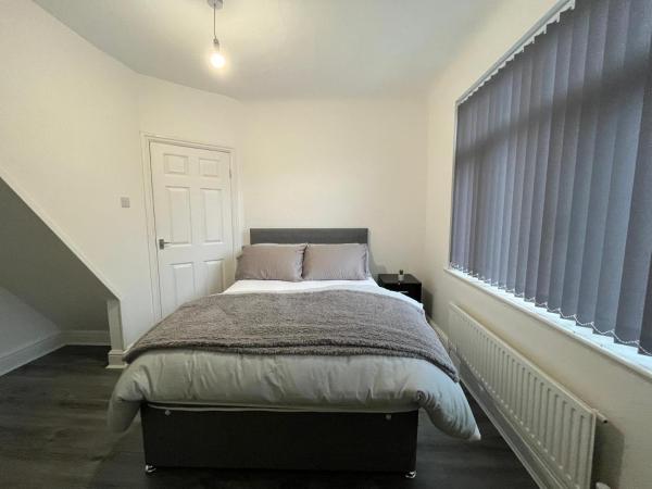 Blue Rain 4 : photo 1 de la chambre chambre double avec salle de bains commune