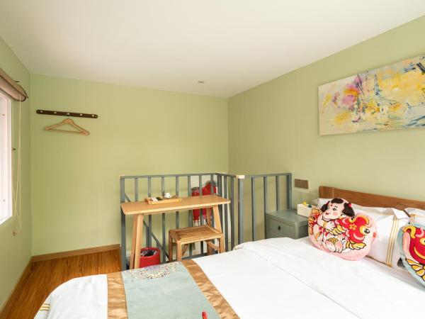 Rong Hotel - Beijing Nanluoguxiang Branch : photo 3 de la chambre chambre quadruple en duplex