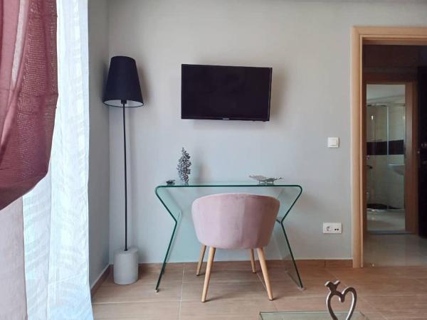 Melenia Suites : photo 6 de la chambre appartement 1 chambre de luxe - vue sur jardin