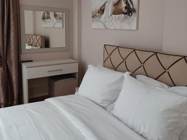 Melenia Suites : photo 3 de la chambre appartement 1 chambre deluxe - vue sur ville