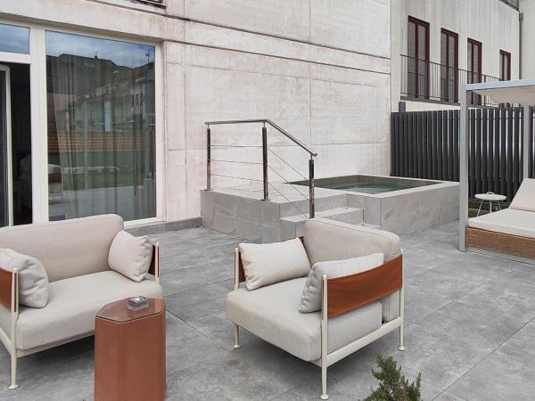 Catalonia Porto : photo 3 de la chambre chambre lits jumeaux supérieure avec terrasse et piscine privée