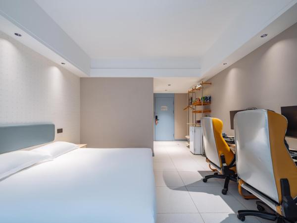 网鱼电竞酒店(竹山路地铁站店) : photo 1 de la chambre chambre lit queen-size