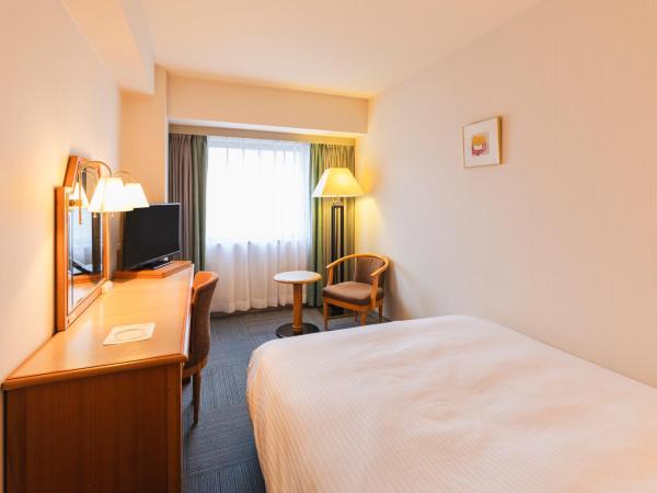 Hotel Sunroute Niigata : photo 1 de la chambre chambre double avec petit lit double - fumeurs