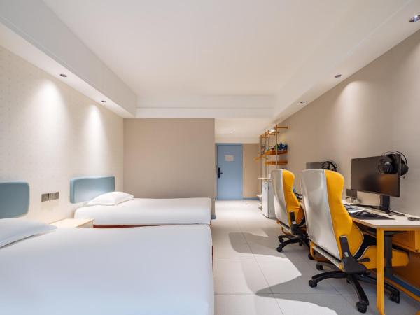 网鱼电竞酒店(竹山路地铁站店) : photo 4 de la chambre chambre lits jumeaux