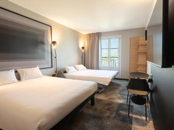 ibis Strasbourg Centre Gare : photo 2 de la chambre chambre double supérieure avec canapé