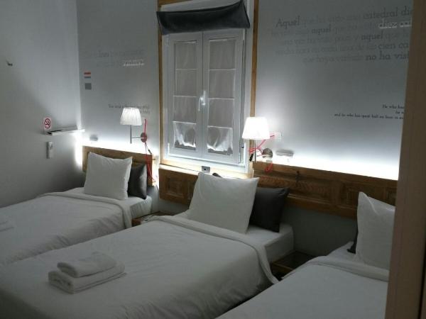 diezmadrid : photo 1 de la chambre chambre triple avec salle de bains privative