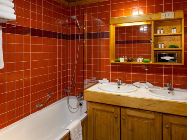 Hôtel Courcheneige : photo 4 de la chambre chambre familiale